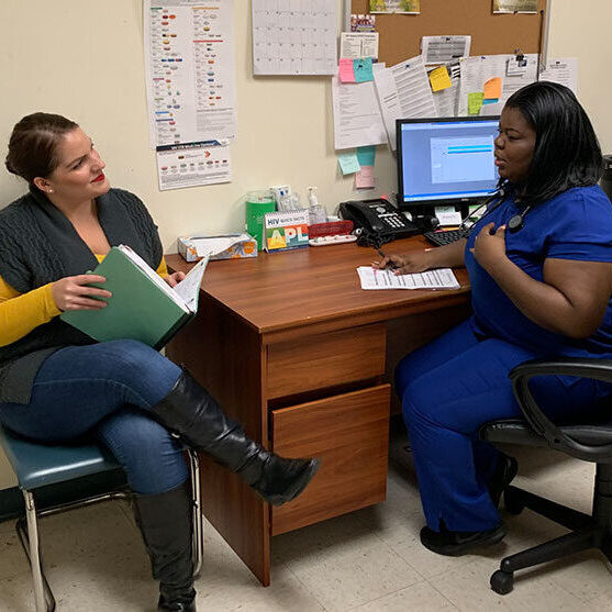 a nurse consulting with a patient